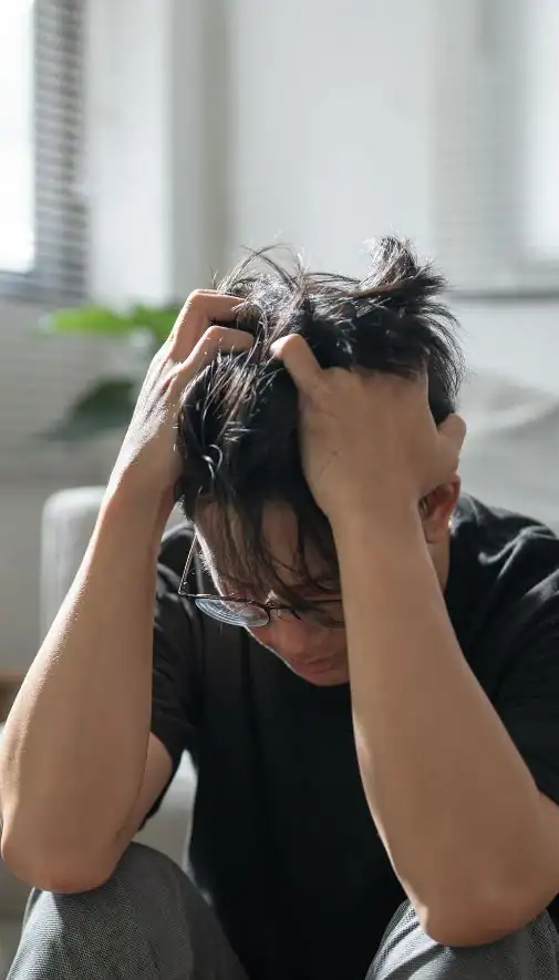 Image of upset man because of erectile dysfunction symptoms Birmingham