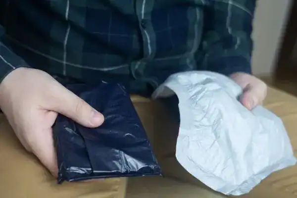 image of man holding stool incontinence Birmingham products